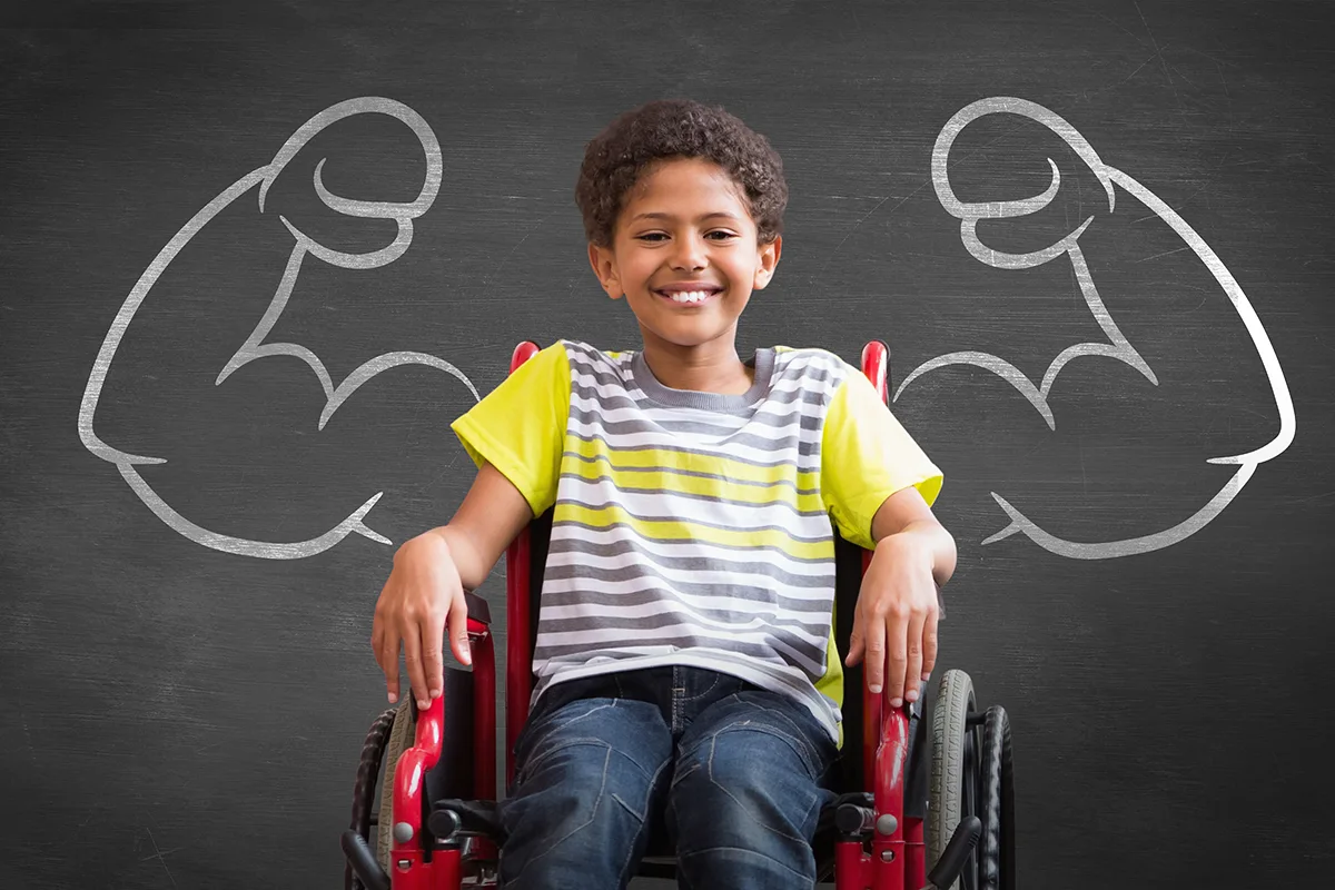 Image of smiling child in wheelchair